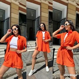 Фотография Костюм женский 060 orange р.42-48 "Tori" недорого оптом от прямого поставщика